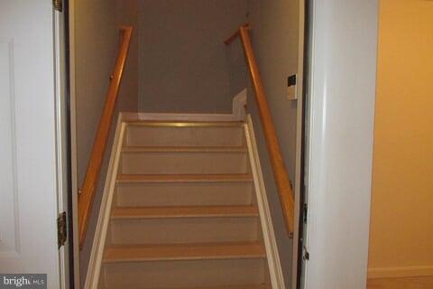 7102 Greenbank Road Baltimore, MD 21220 - Photo 20 of 30 a view of staircase with white walls