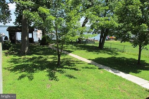 7102 Greenbank Road Baltimore, MD 21220 - Photo 6 of 30 a view of a yard with a tree