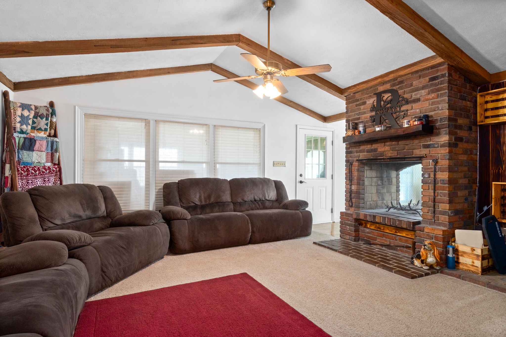 5150 Cadiz Road Hopkinsville, KY 42240 - Photo 20 of 45 a living room with furniture and a window