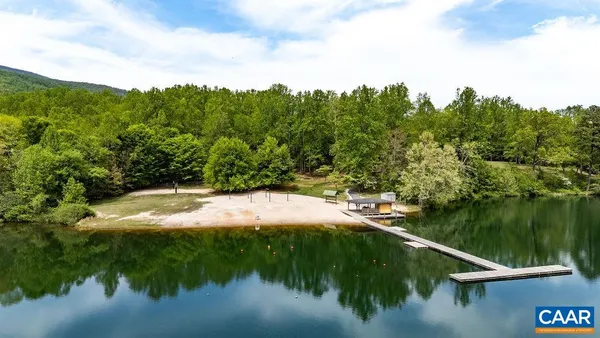 a view of a lake with a mountain in the background