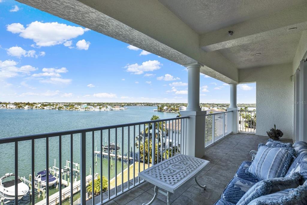 17745 Gulf Boulevard, Unit 604 Redington Shores, FL 33708 - Photo 12 of 44 a view of a balcony with furniture