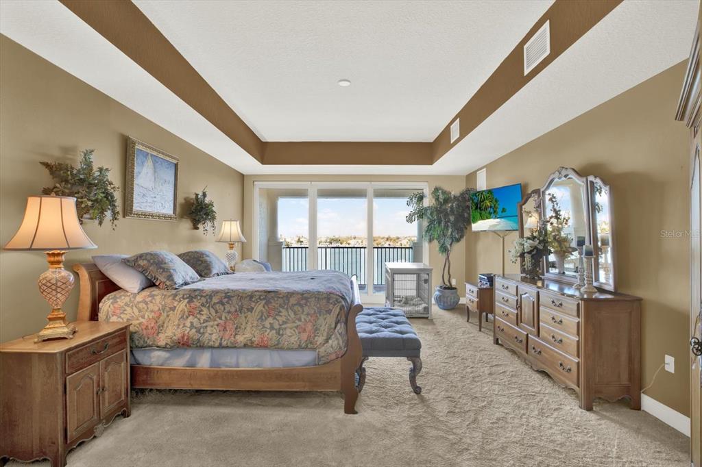 17745 Gulf Boulevard, Unit 604 Redington Shores, FL 33708 - Photo 13 of 44 a bedroom with furniture and a large window