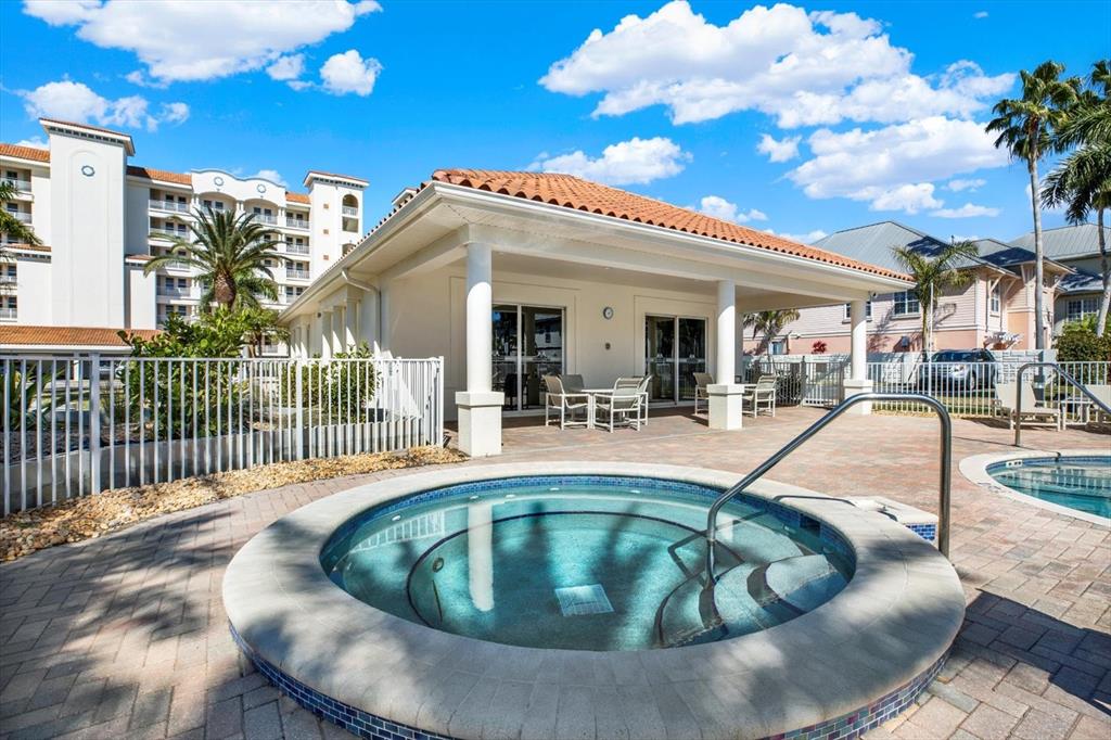 17745 Gulf Boulevard, Unit 604 Redington Shores, FL 33708 - Photo 29 of 44 a view of a house with swimming pool and sitting area