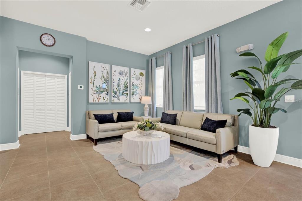 17745 Gulf Boulevard, Unit 604 Redington Shores, FL 33708 - Photo 32 of 44 a living room with furniture and a large window