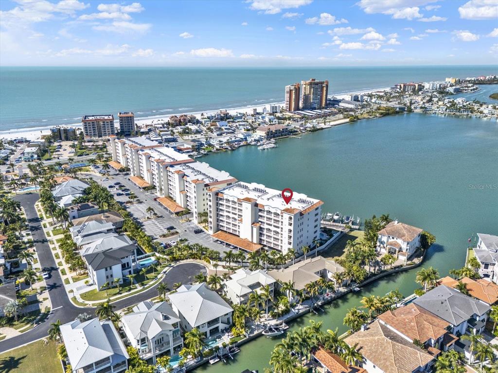 17745 Gulf Boulevard, Unit 604 Redington Shores, FL 33708 - Photo 38 of 44 an aerial view of a houses with outdoor space