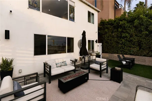 a building outdoor space with patio furniture
