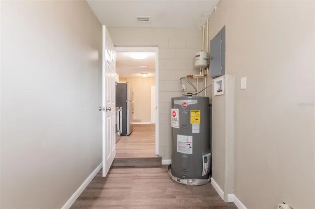 a view of a hallway view with staircase