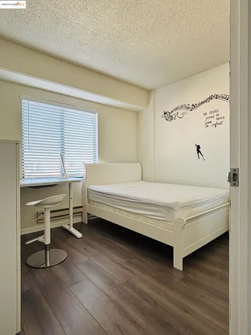 a bathroom with a sink a mirror and a bathtub