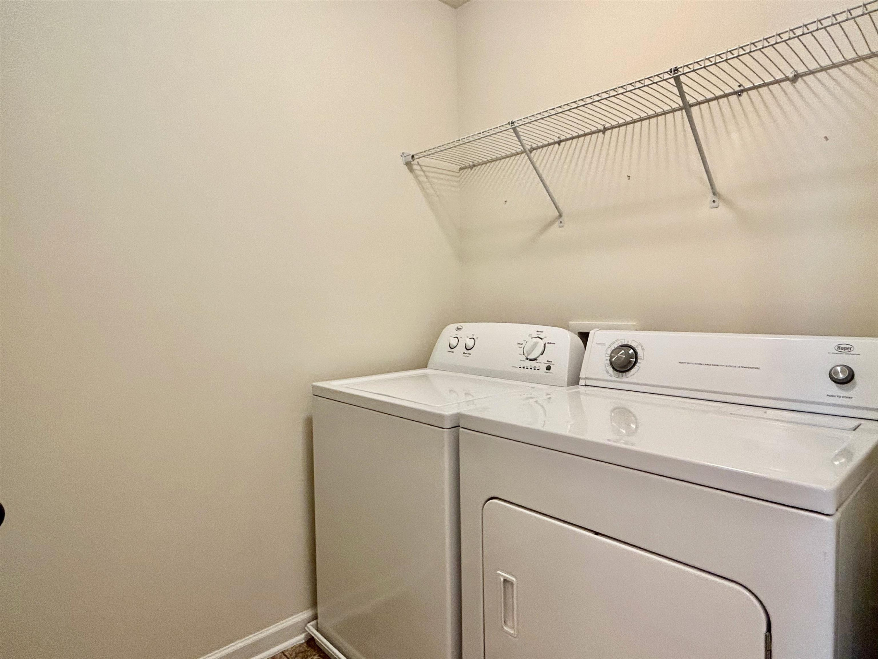7804 Elmshire Way Raleigh, NC 27616 - Photo 24 of 41 a utility room with dryer and washer