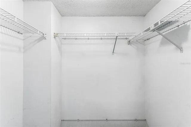 a view of a room with racks on the wall