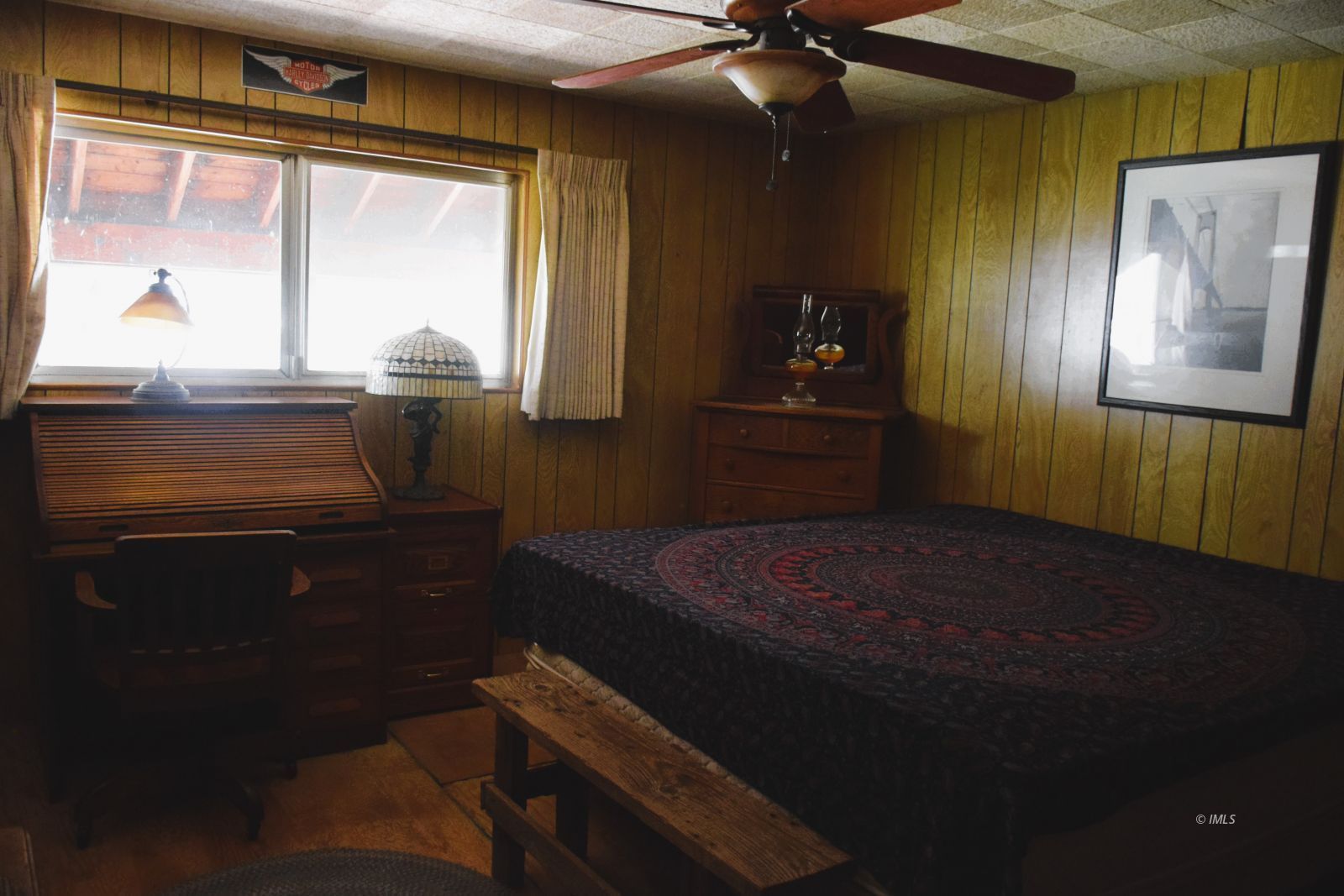 140 Iris Bishop, CA 93514 - Photo 13 of 19 a bedroom with a bed and large windows