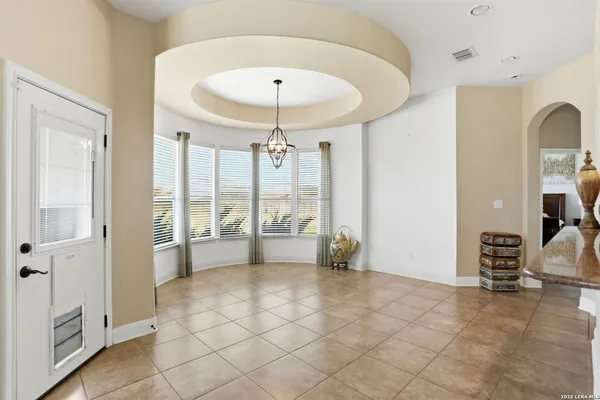 a view of an empty room and window