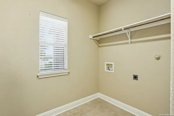 a view of a room that has a window in it
