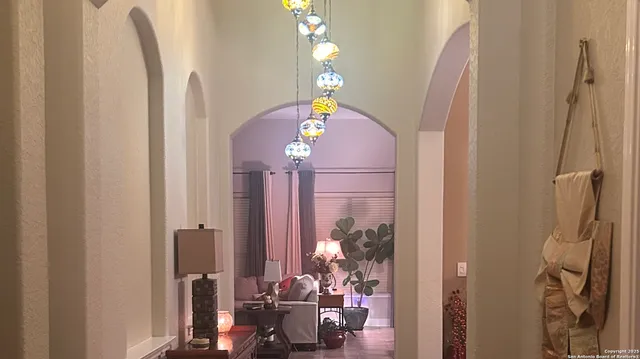 a view of living room with a mirror