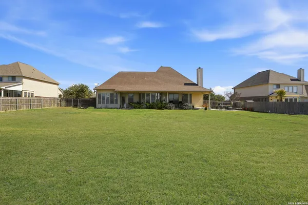 a view of a house with a big yard
