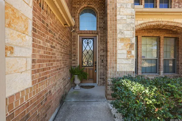 a view of a brick house with front door