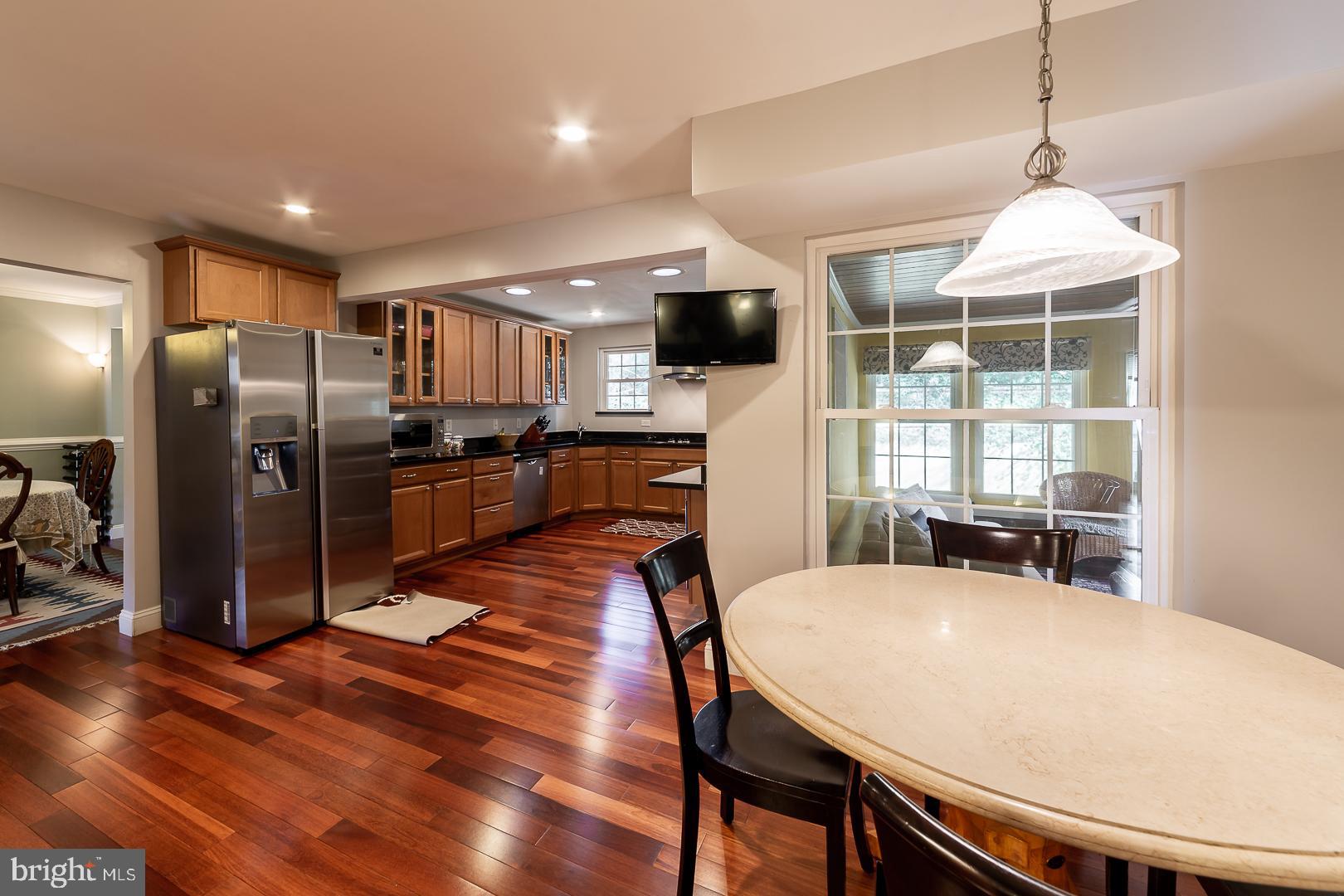 10813 Gainsborough Road Potomac, MD 20854 - Photo 10 of 41 Brazilian Cherry in Expanded Kitchen
