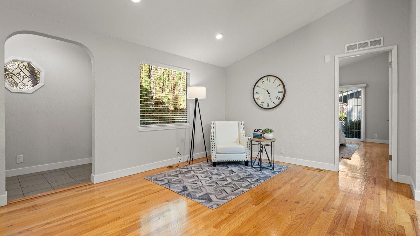 14355 La Rinconada Drive Los Gatos, CA 95032 - Photo 12 of 42 a bedroom with a bed and wooden floor