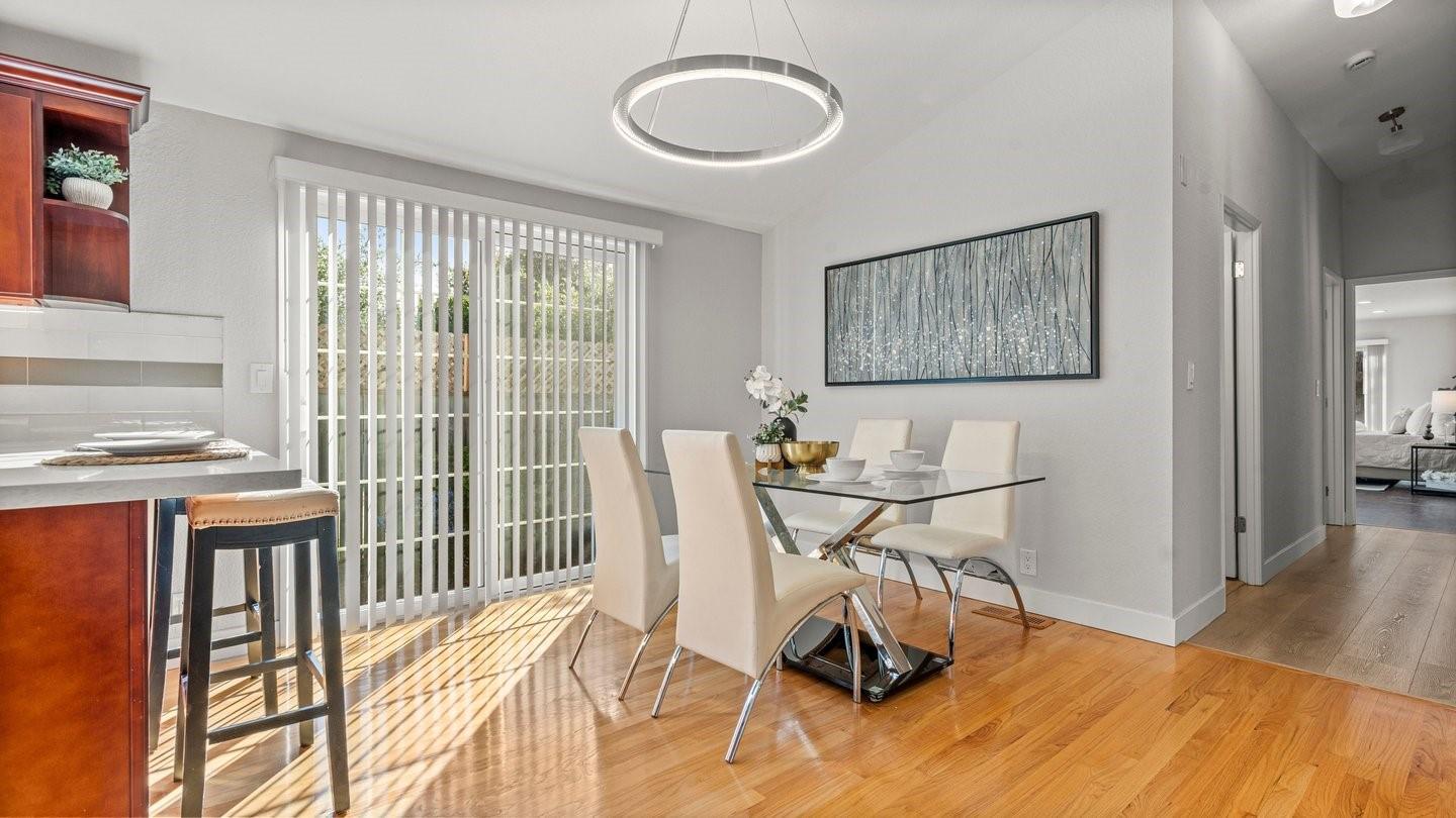 14355 La Rinconada Drive Los Gatos, CA 95032 - Photo 17 of 42 a view of a dining room with furniture and wooden floor