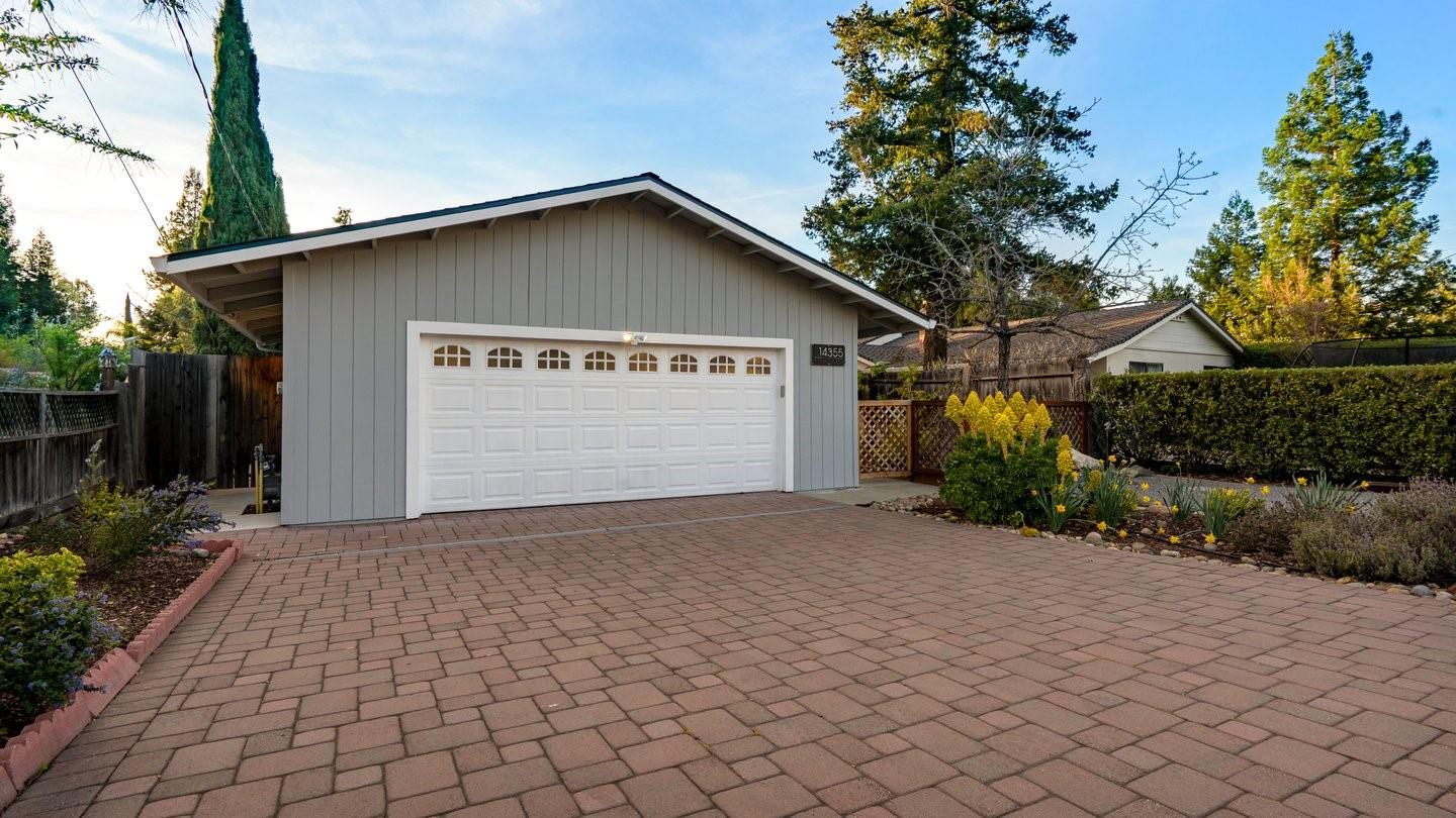 14355 La Rinconada Drive Los Gatos, CA 95032 - Photo 2 of 42 a view of backyard of house with green space
