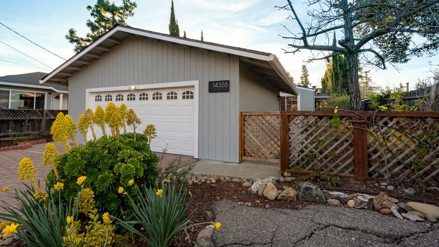 14355 La Rinconada Drive Los Gatos, CA 95032 - Photo 3 of 42 a view of a house with a yard