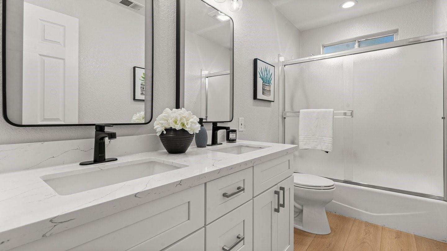 14355 La Rinconada Drive Los Gatos, CA 95032 - Photo 34 of 42 a bathroom with a sink toilet and shower