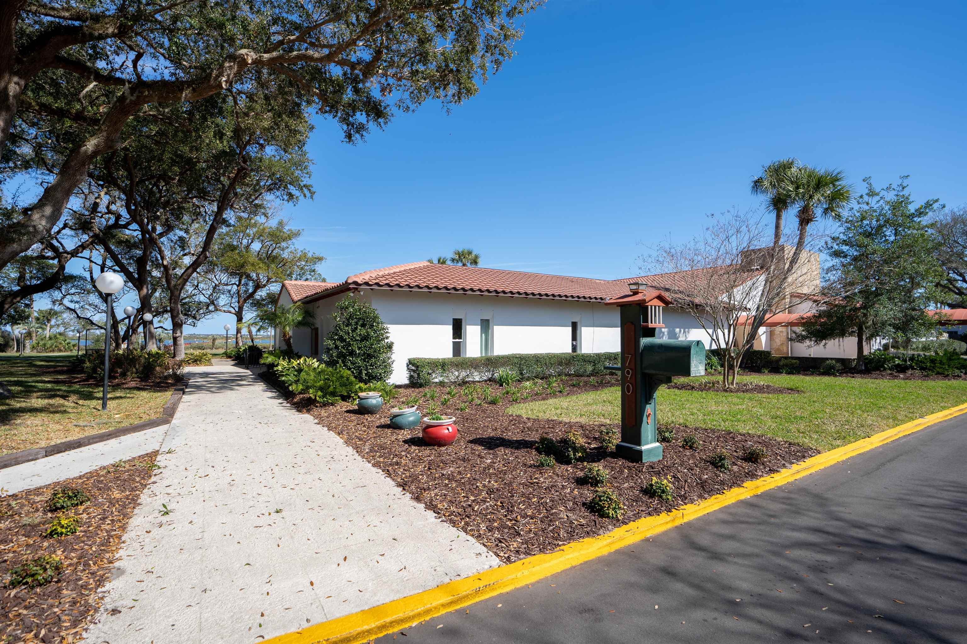 258 Costado Street St. Augustine, FL 32086 - Photo 32 of 39 a front view of a house with a yard