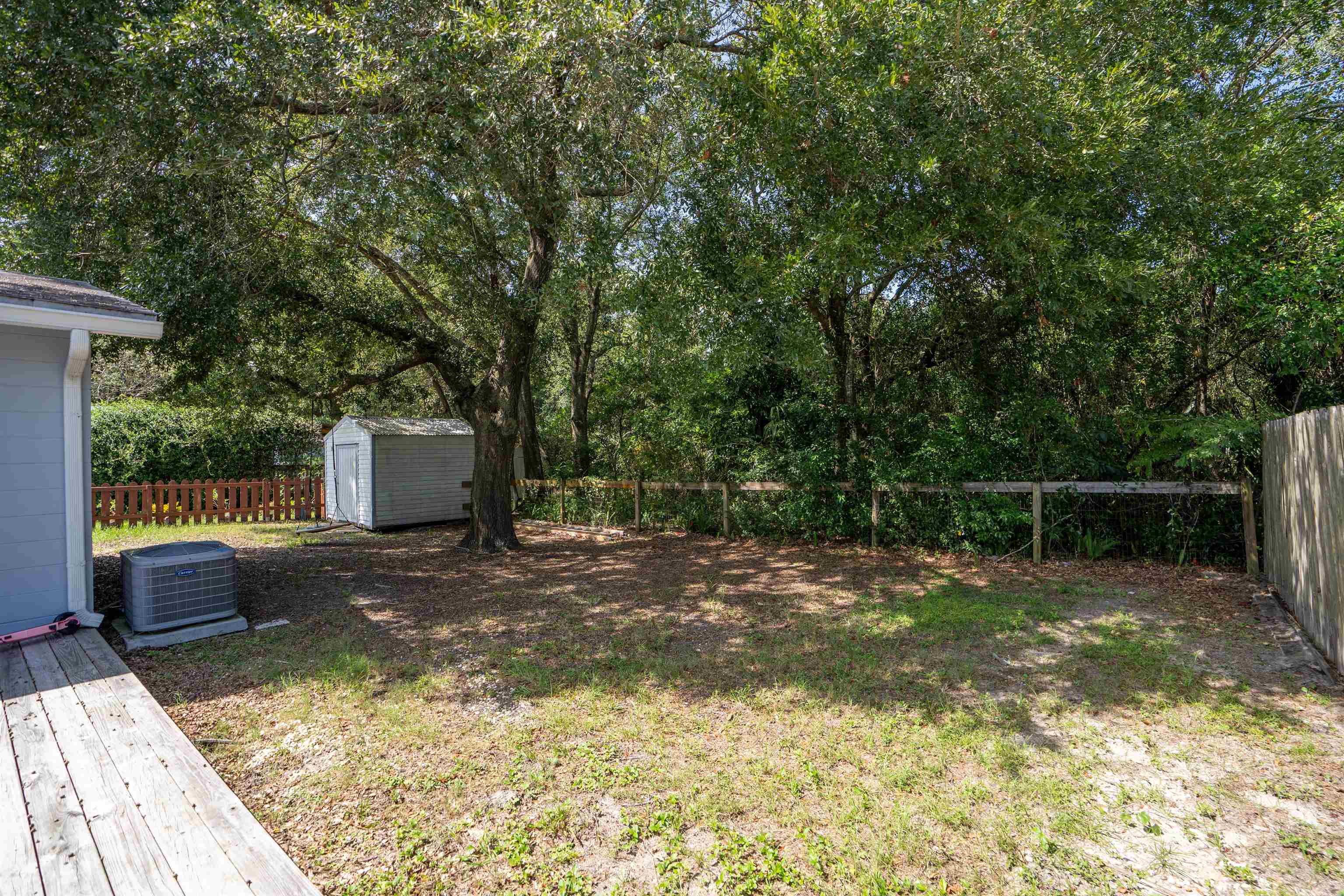 258 Costado Street St. Augustine, FL 32086 - Photo 9 of 39 a view of a backyard