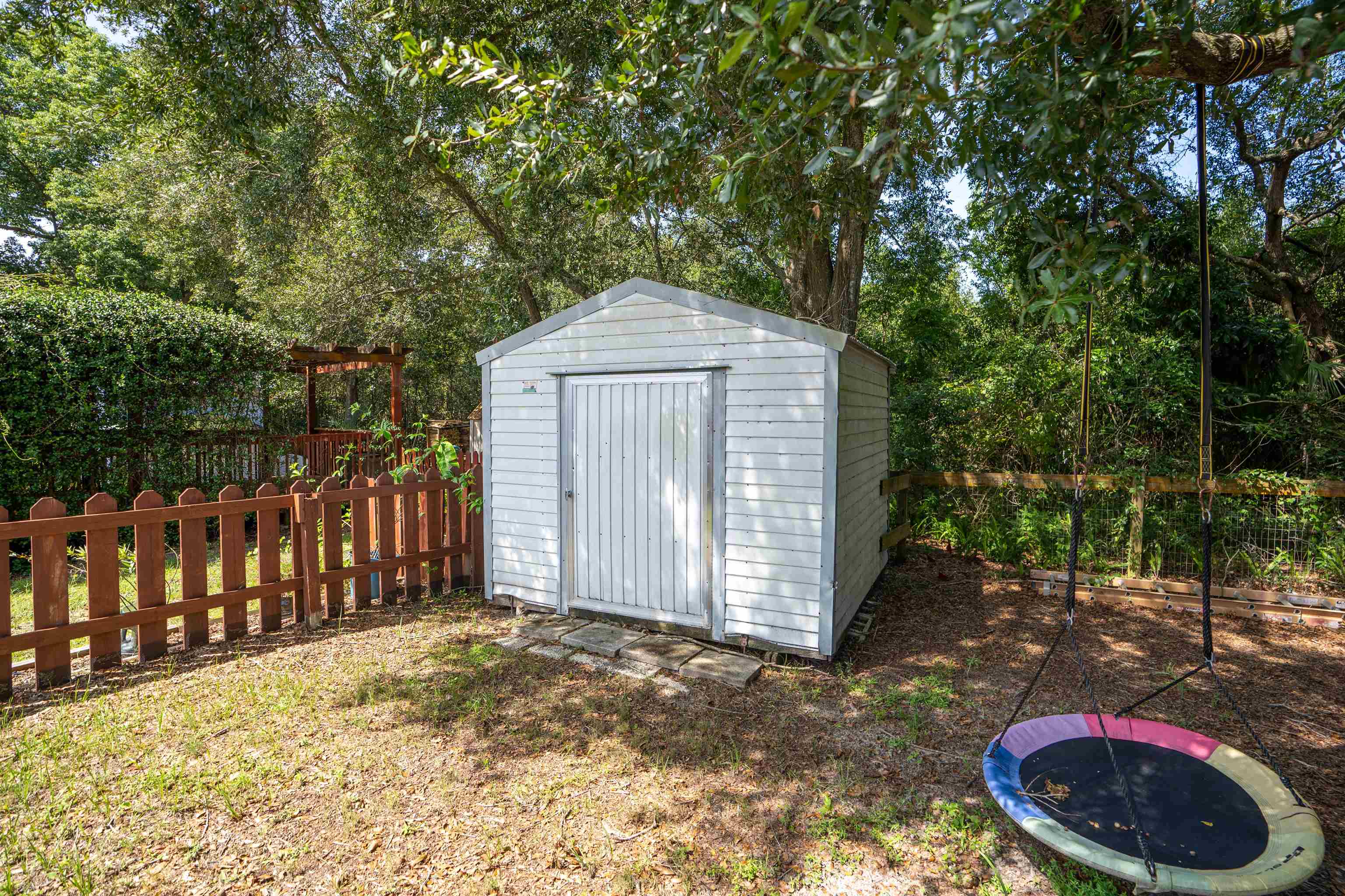 258 Costado Street St. Augustine, FL 32086 - Photo 10 of 39 a backyard of a house with lots of green space
