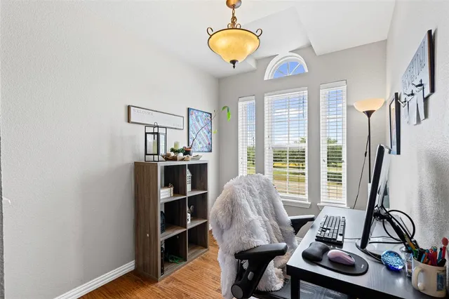 a view of a livingroom with furniture and window