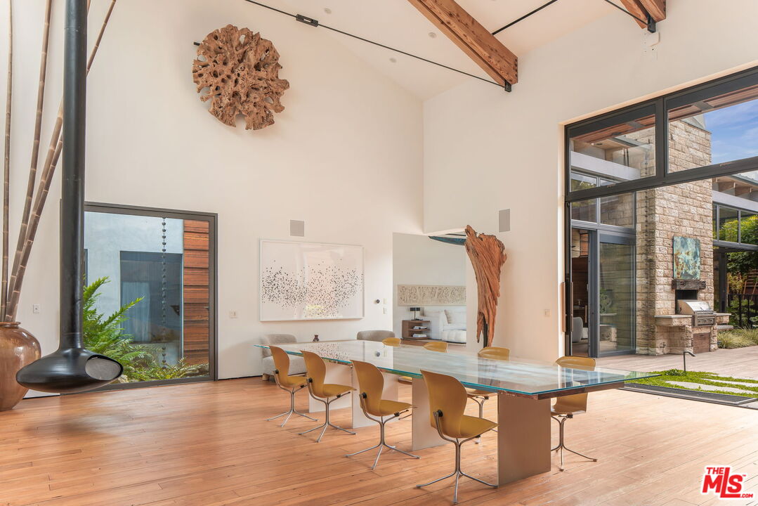 345 West Channel Road Santa Monica, CA 90402 - Photo 15 of 35 a view of living room with furniture and floor to ceiling windows
