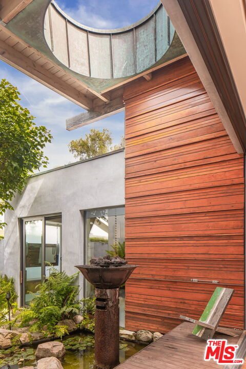 345 West Channel Road Santa Monica, CA 90402 - Photo 26 of 35 a front view of a house with entryway