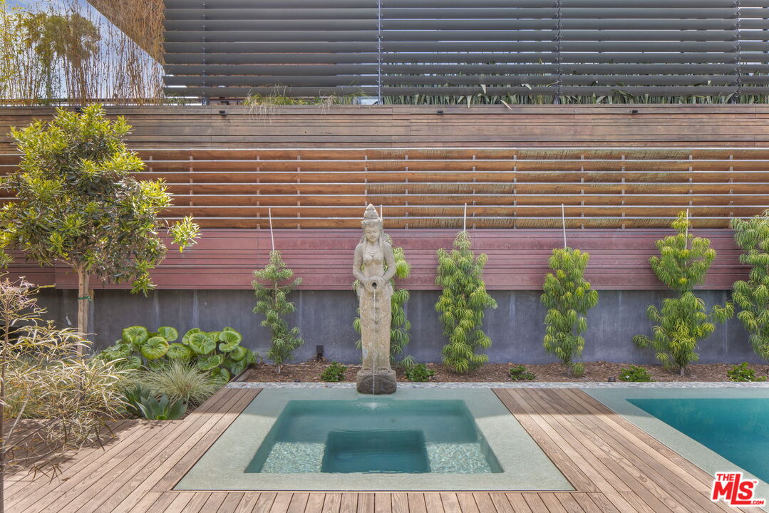 345 West Channel Road Santa Monica, CA 90402 - Photo 30 of 35 a view of a brick house with plants