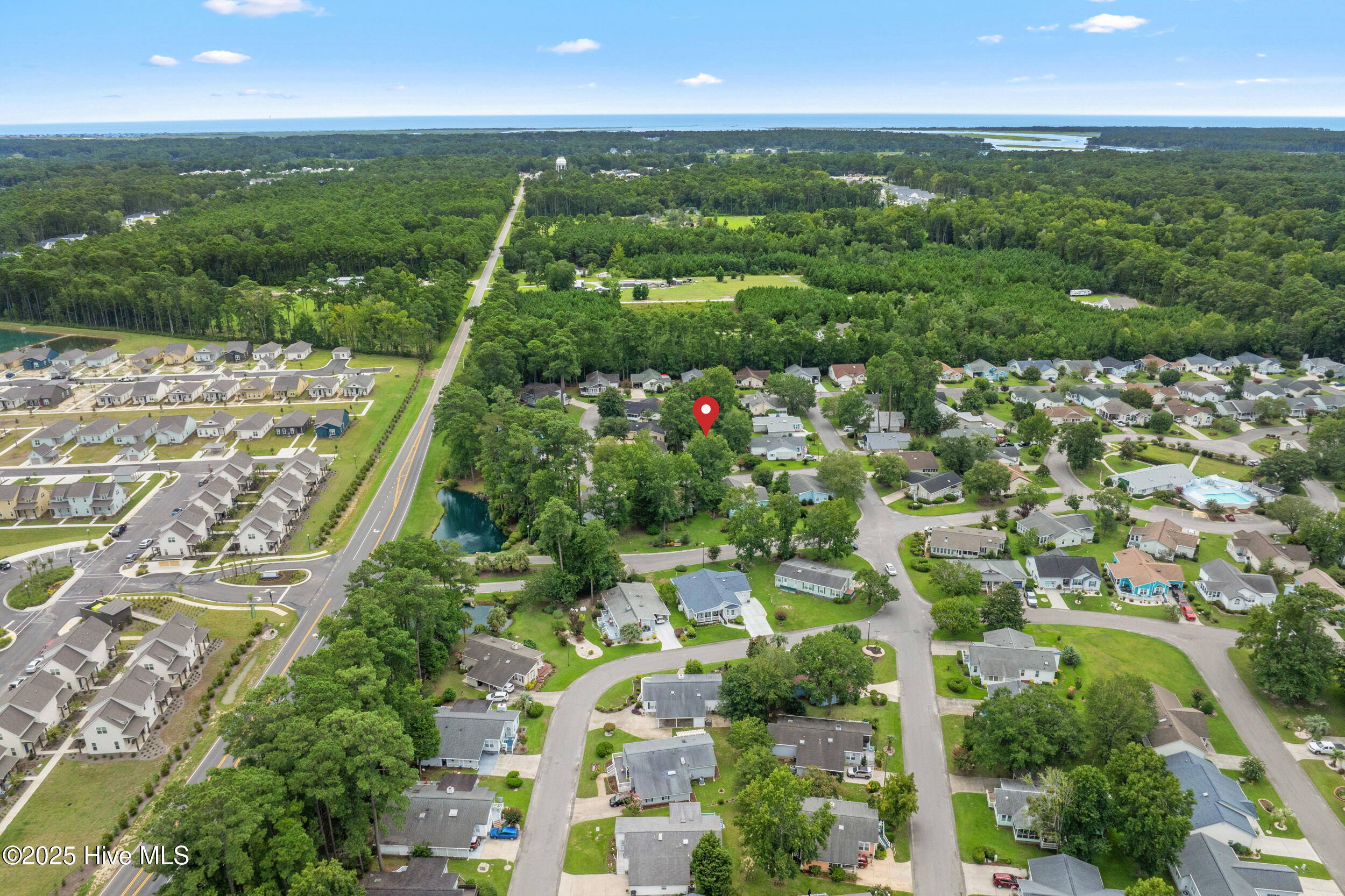 396 Deer Path Calabash, NC 28467 - Photo 25 of 33 Looking back towards 396 Deer Path. This property is minutes from downtown Calabash, with restaurants and shopping and a short drive to the local South Brunswick Island beaches and entertainment. The red pin marks the location of 396 Deer Path.
