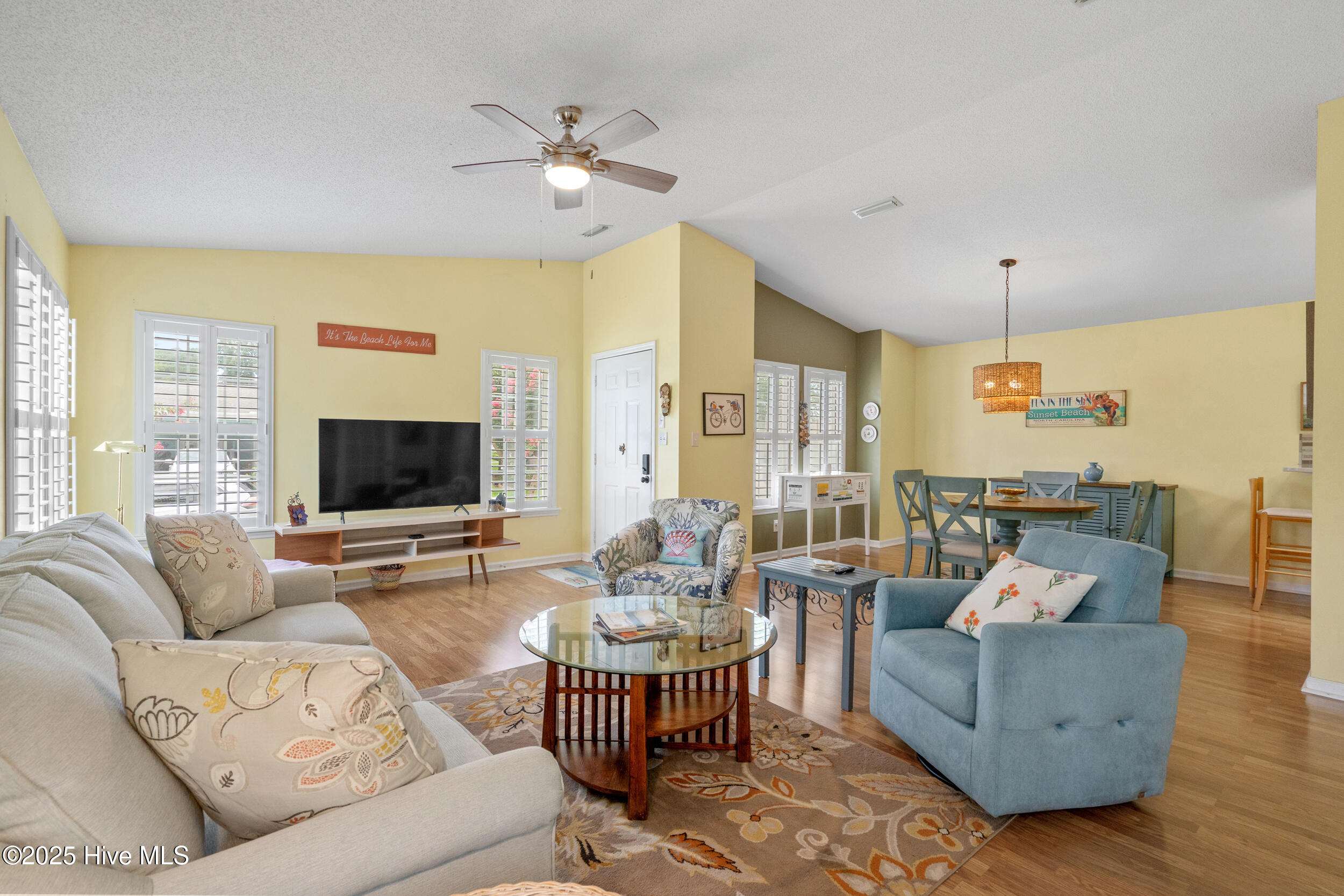 396 Deer Path Calabash, NC 28467 - Photo 5 of 33 The living room is not just about square footage; it's about the freedom it provides, its versatility, and the atmosphere it cultivates.