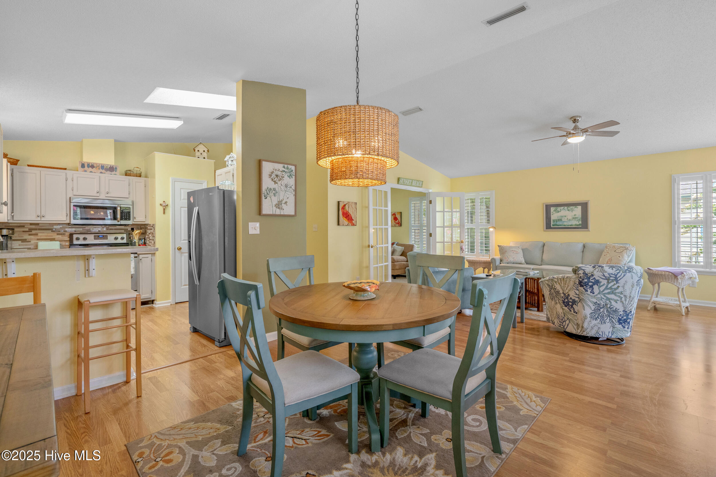 396 Deer Path Calabash, NC 28467 - Photo 9 of 33 The open connection between the kitchen and dining room facilitates effortless hosting and entertaining. Whether it's a casual family dinner or a more formal gathering with friends, the transition from food preparation to dining is seamless, promoting a relaxed and inclusive environment.