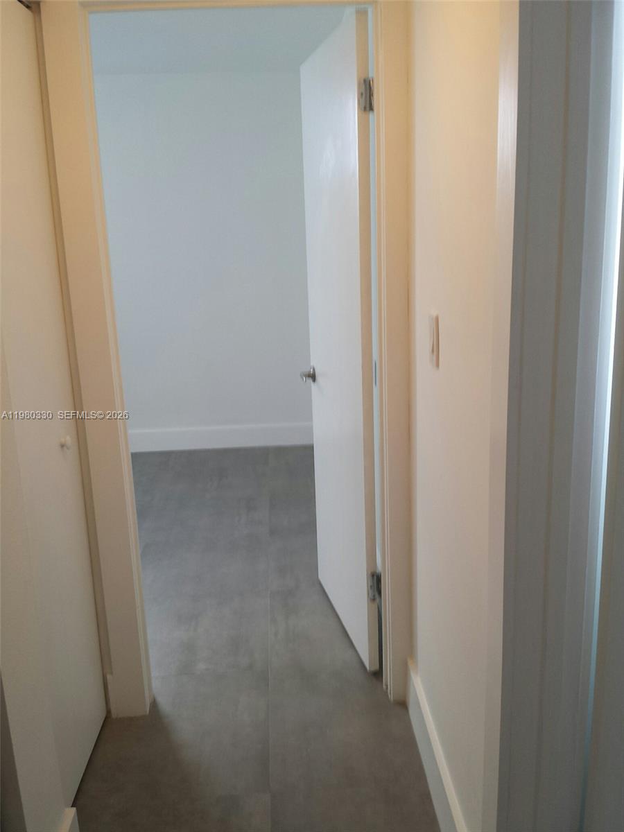 9441 Southwest 4th Street, Unit 302 Miami, FL 33174 - Photo 11 of 24 a view of a hallway