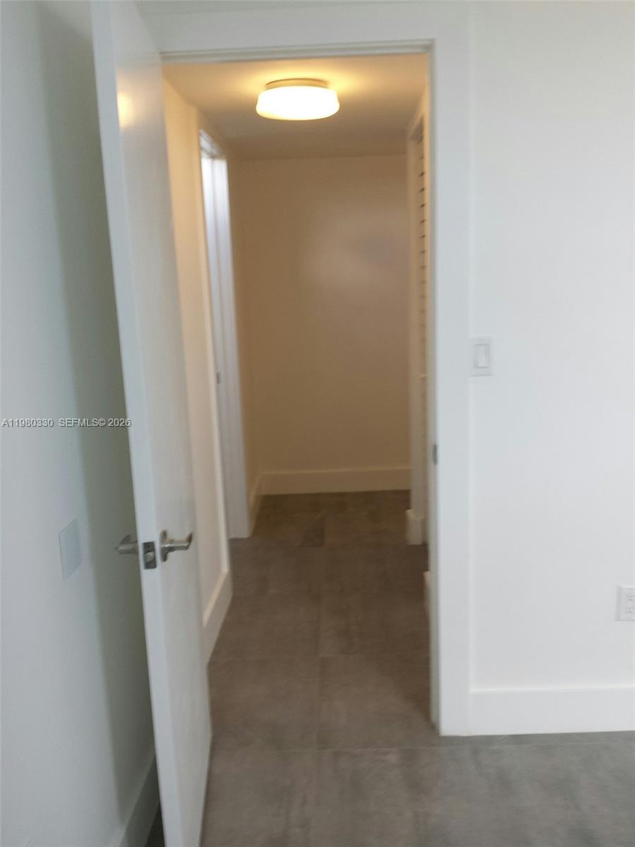 9441 Southwest 4th Street, Unit 302 Miami, FL 33174 - Photo 13 of 24 view of a room with door