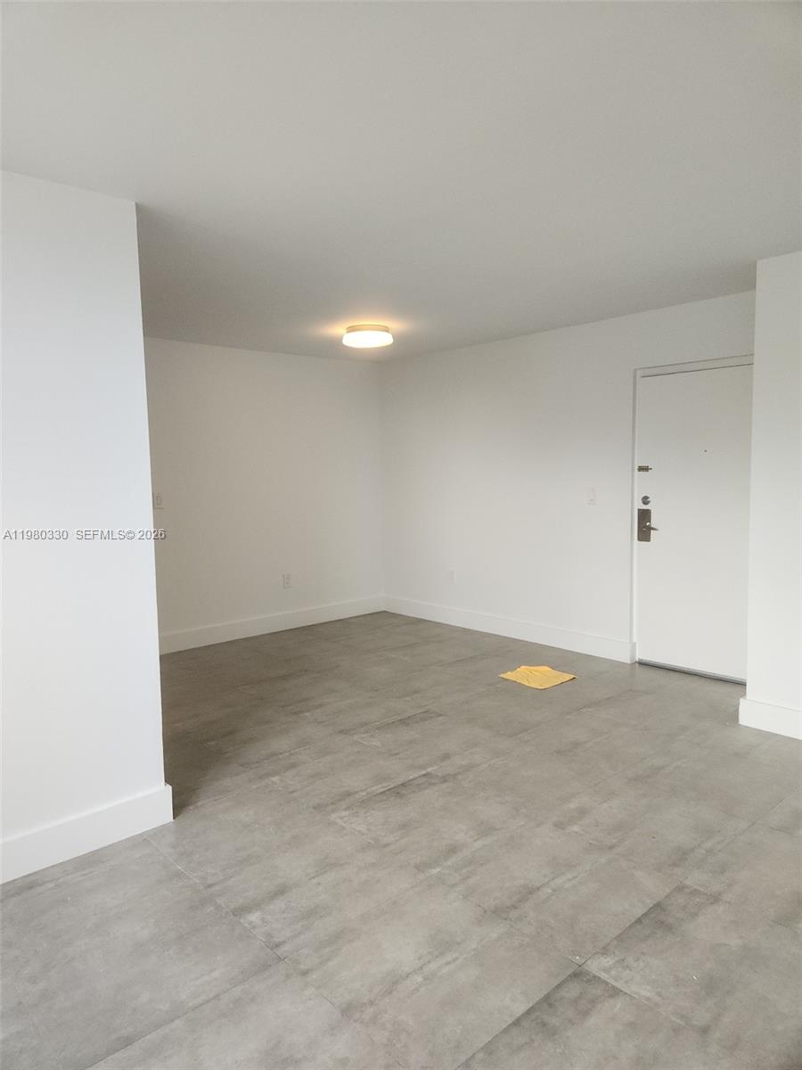 9441 Southwest 4th Street, Unit 302 Miami, FL 33174 - Photo 2 of 24 a view of an empty room
