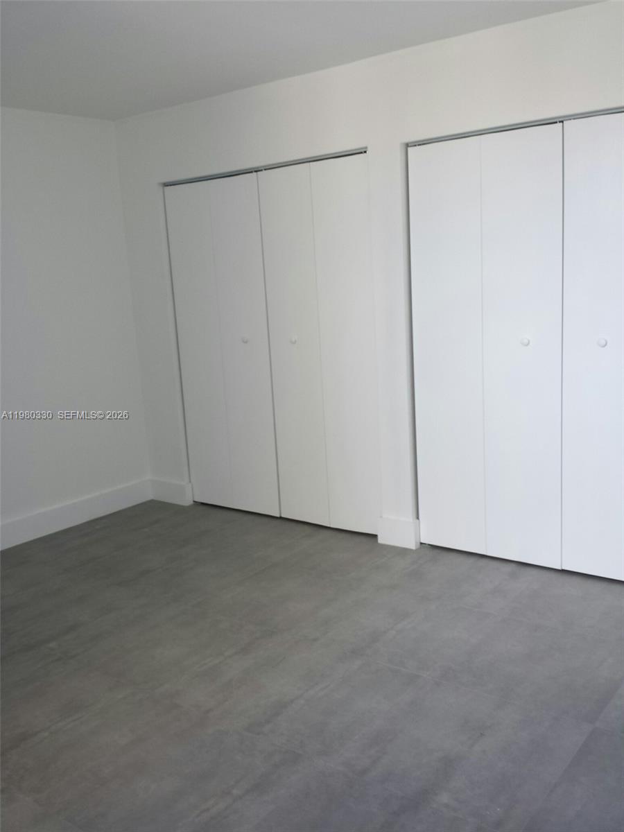 9441 Southwest 4th Street, Unit 302 Miami, FL 33174 - Photo 8 of 24 a view of an empty room