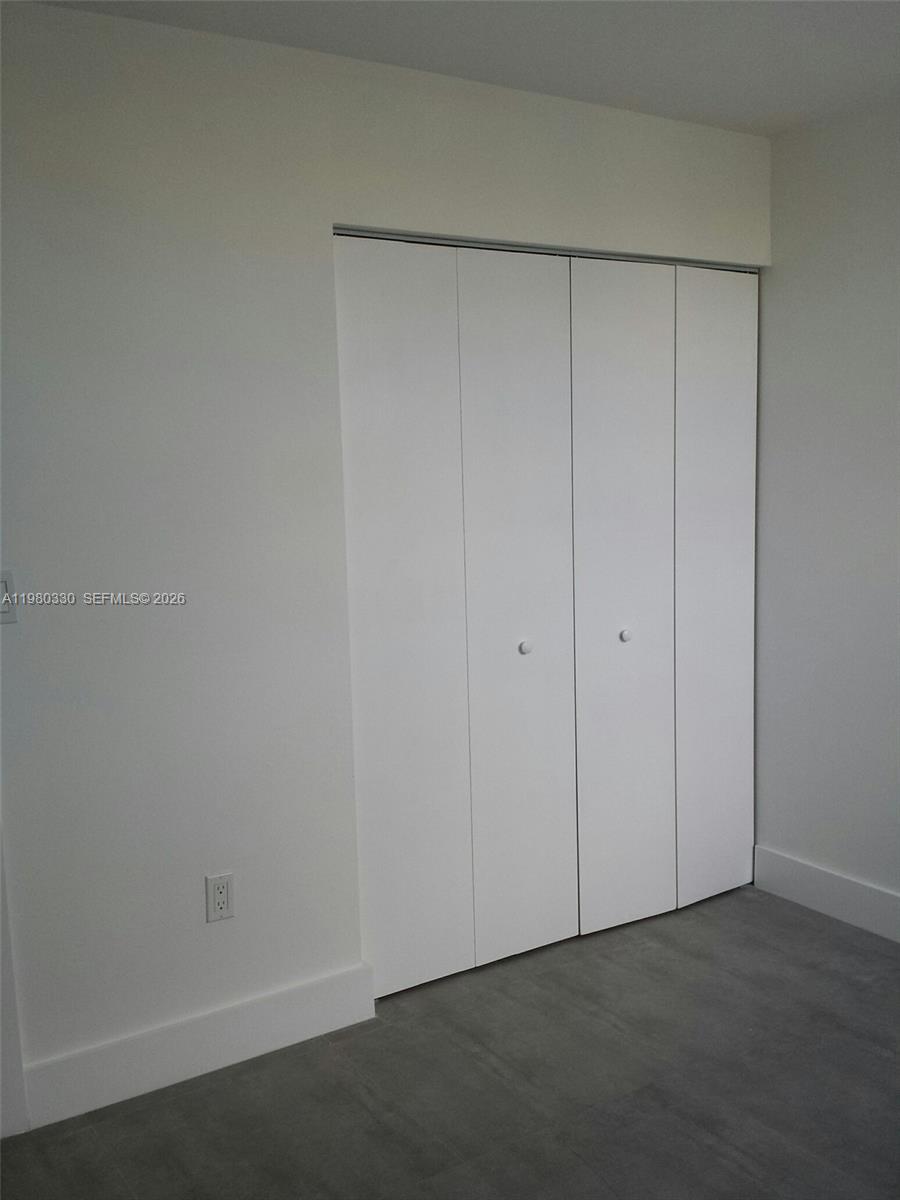 9441 Southwest 4th Street, Unit 302 Miami, FL 33174 - Photo 9 of 24 a view of an empty room