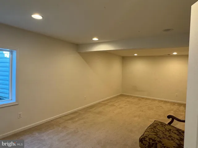 an empty room with a couch
