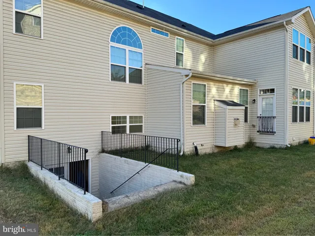 a front view of house with yard
