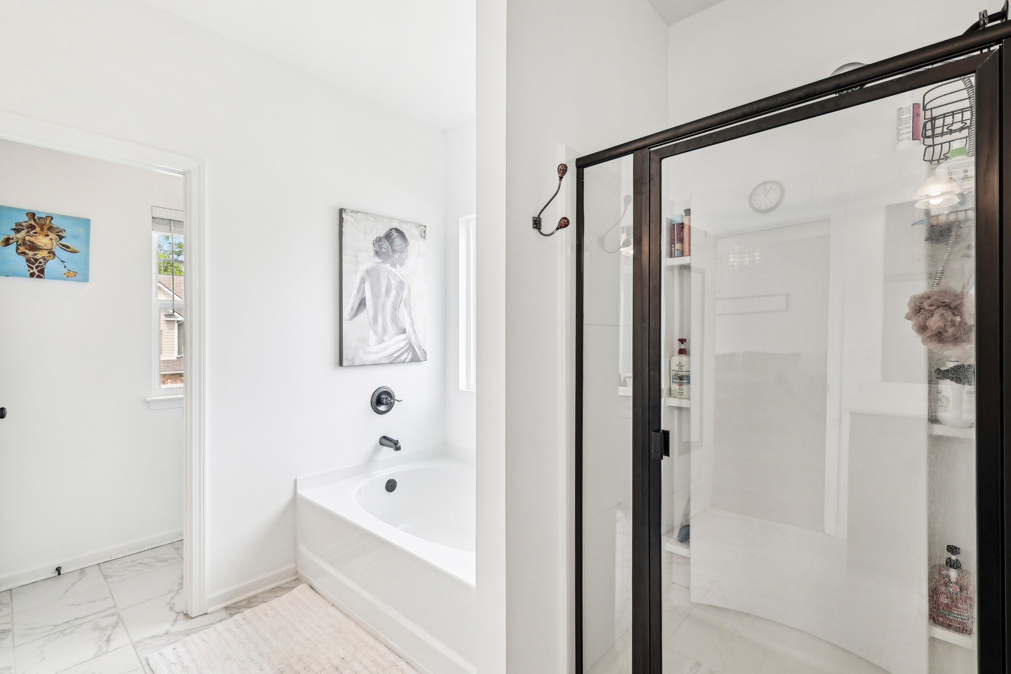 211 Hanson Lane Columbia, TN 38401 - Photo 22 of 35 a bathroom with a bathtub and a shower