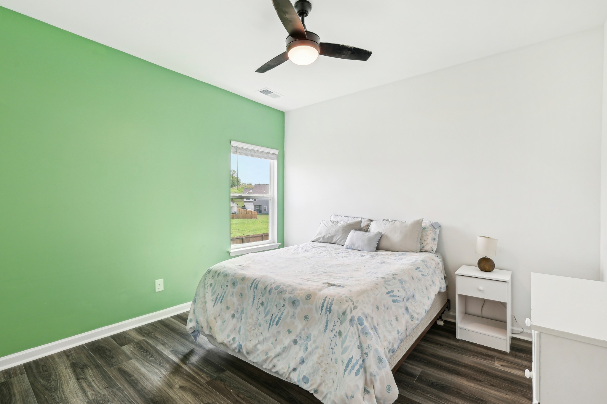 211 Hanson Lane Columbia, TN 38401 - Photo 26 of 35 a bedroom with a bed and a window