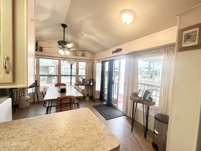 a white refrigerator freezer sitting inside of a kitchen