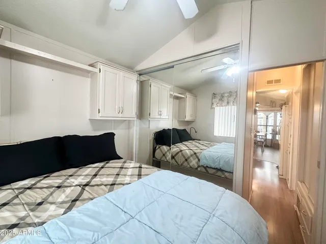 a living room with furniture a table and a window