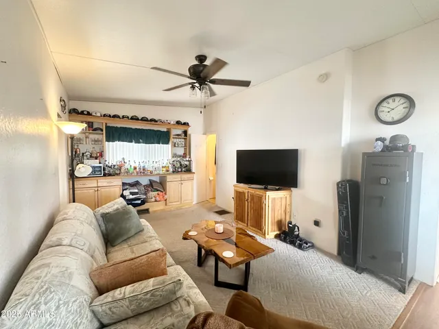 a view of swimming pool with outdoor seating