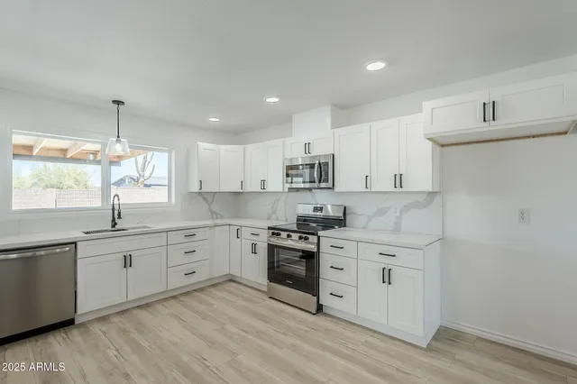 an empty room with fan