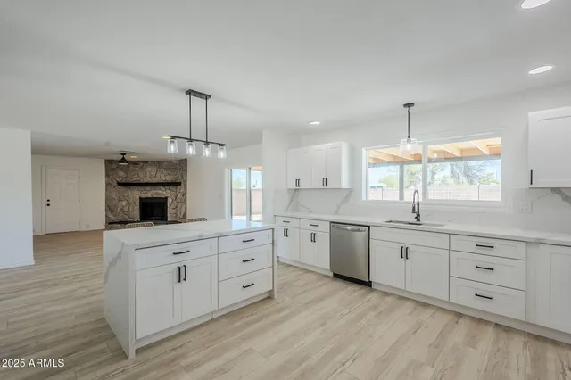a view of a swimming pool with a lounge chair